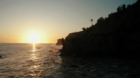 Malibu california westcoast sunset aerial drone coastline waves rocks mountain Stock Footage