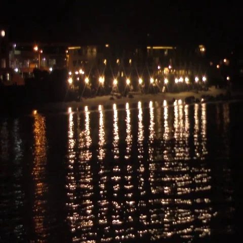 Malibu lights reflecting in the ocean Video stock 69723924
