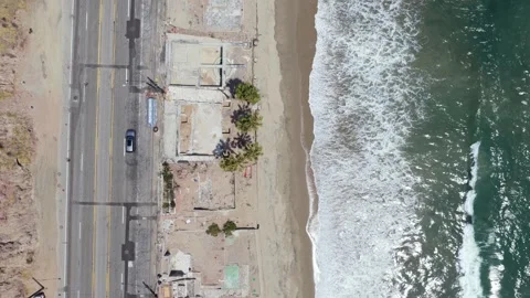 Malibu luxury real estate development on sandy beach, showcasing oceanfront prop Stock Footage 336439115
