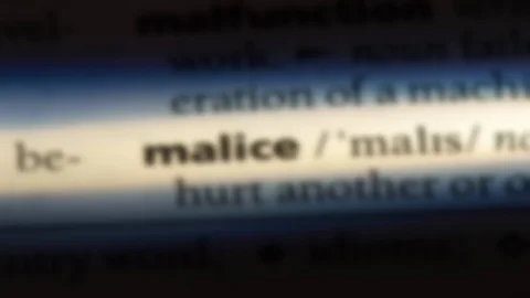 Malice word in a dictionary. Stock Footage 99563295