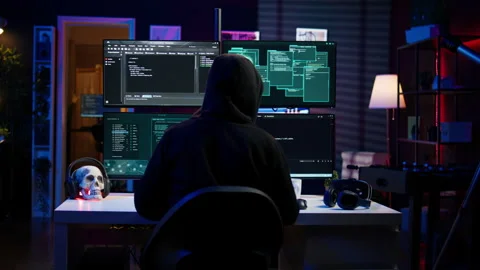 Malicious man hacking, stealing credit card numbers Stock Footage 275750526