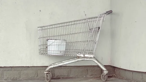 Mall Cart Next To The Wall Stock Footage 126236583