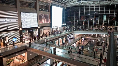 Mall Crowd People Walking Ads on Screen Night Time Shopping Spree Stock Footage