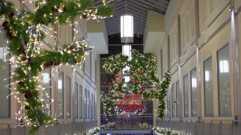 The mall is decorated with Christmas decorations, fir branches with illumination Stock Footage