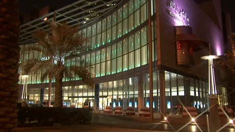 A mall with the Faisaliah Tower in the background. Stock Footage 120059069
