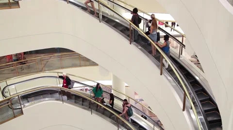 Mall with people riding escalator Stock Footage 44287152