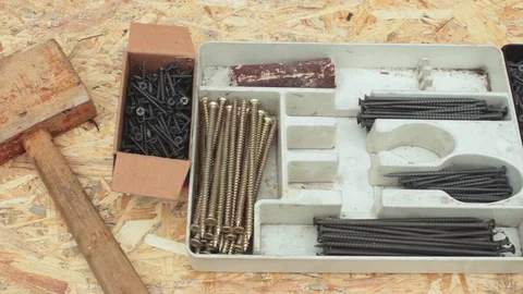 Mallet and self-tapping screws Stock Footage 77937459