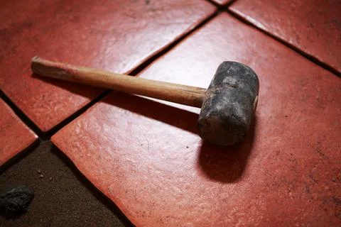 Mallet on Ceramics Tile Stock Photos