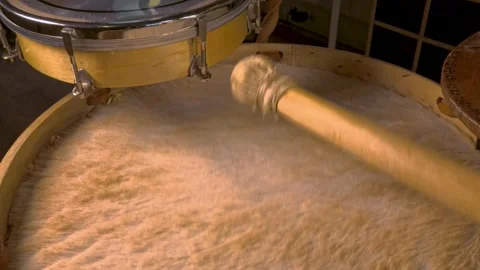 Mallet Hitting Furry Drum Head of Traditional Bombo Leguero Drum, Close Up Stock Footage 340064126
