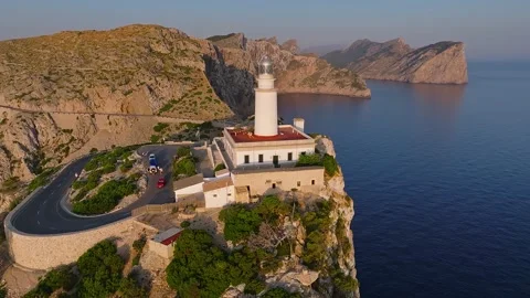 Mallorca - Flying around of the Lighthouse at Cap de Formentor at sunrise Stock Footage 337651391