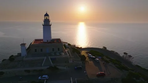 Mallorca, Spain - Flying by the Lighthouse at Cap de Formentor at sunrise Stock Footage 337651150