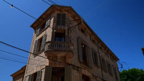 Mallorca, Valldemossa. 05-14-2026. Typical Majorcan building in a sunny day Stock Footage 339298061