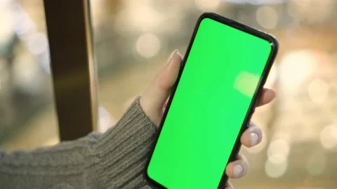Mall.Use green screen for copy space closeup. Chroma key mock-up on smartphone Stock Footage 220604673
