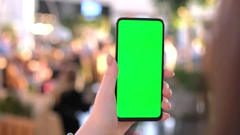Mall.Use green screen for copy space closeup. Chroma key mock-up on smartphone Stock-Footage 236456872