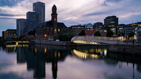 Malmo Sunset cityscape landmarks from day to night panorama timelapse Stock Footage 233660357