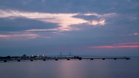 Malmo Sunset Landscape border Sweden - Denmark bridge over Oresund Strait Stock Footage 233660831