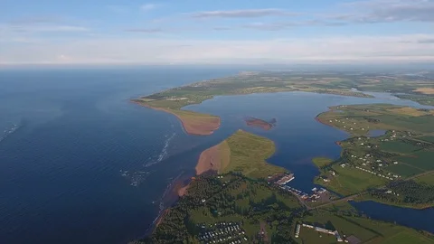 Malpeque Bay high altitude aerial panorama. Ocean, beaches and farms Stock Footage