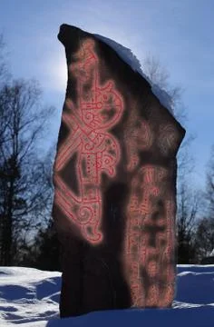 Malsta runestone with illuminated inscriptions in backlight Stock Photos