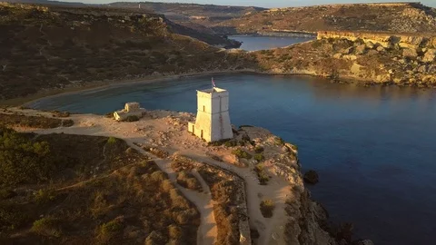 Malta - 4K flying around full circle of Ghajn Tuffieha Watch Tower Stock Footage 91786447
