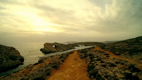 Malta Comino azure window evening drone aerial Stock Footage 107609297