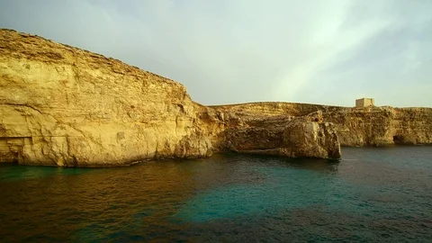 Malta  Comino cliffs and Ocean drone aerial Stock Footage 107610033