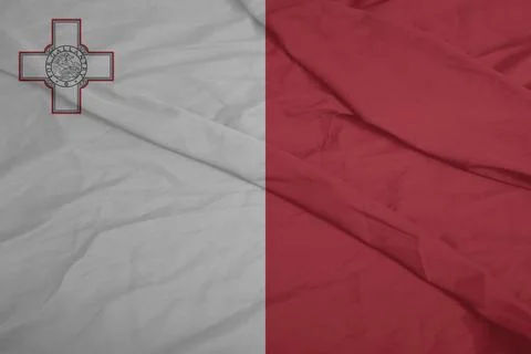 Malta Flag cloth blowing in the light breeze Foto stock