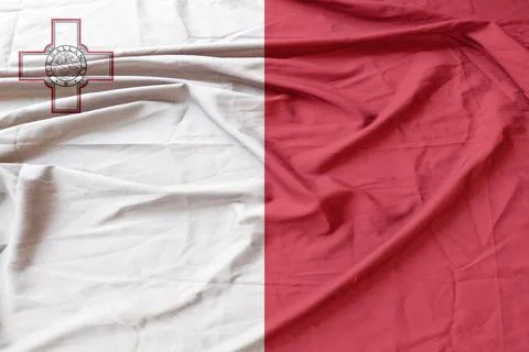 Malta  Flag fabric blowing in the light wind Foto stock
