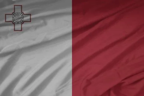 Malta Flag waving in the smooth wind Stock Photos