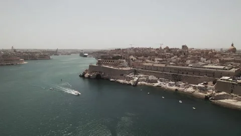 Malta, Valletta Aerial Pull Back of Bay Stock Footage 248011837
