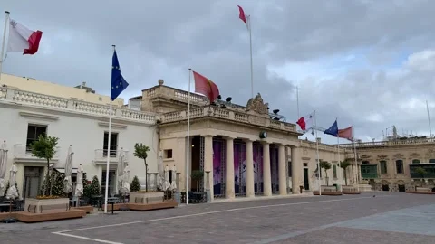 Maltese Flag is waving on top of the Main Guard building. Valletta, Malta Stock Footage 266258290