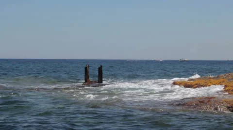 Maltese impressions - dock remains splashed by waves Stock Footage 24977340