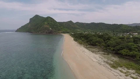 Maluk beach with beautiful waves and hills on Sumbawa Indonesia Video stock 118423523