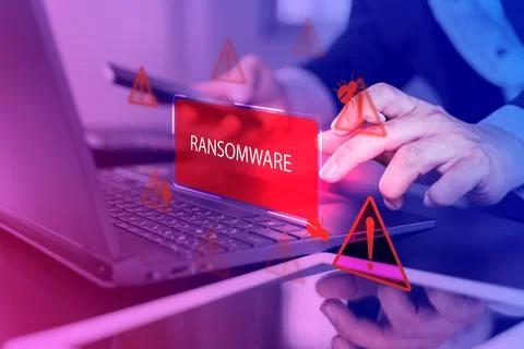 Malware attack virus alert. Person use laptop with virtual warning sign wit.. Foto stock