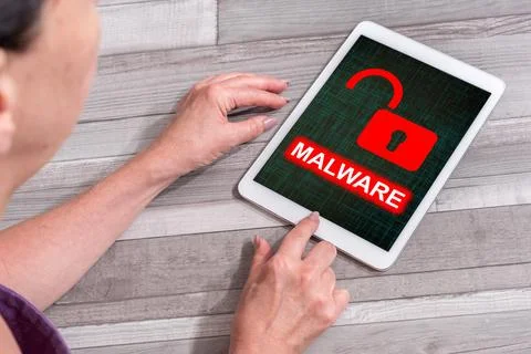 Malware concept on a tablet Stock Photos