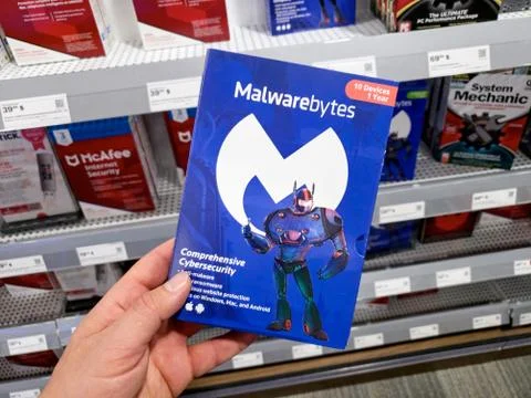 Malwarebytes app and license in a hand Foto stock