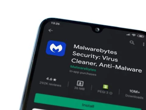 Malwarebytes Security app play store page on the display of a black mobile sm Stock Photos