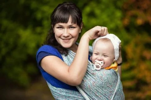 Mama with a baby Stock Photos