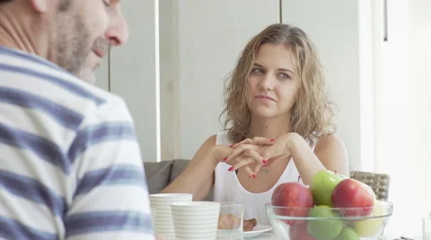 Mama is talking with her childs on breackfast time Video stock 65169702