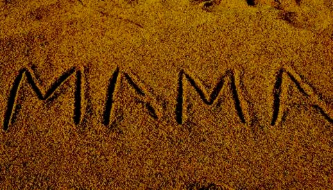 Mama word displayed on sand surface Stock Photos