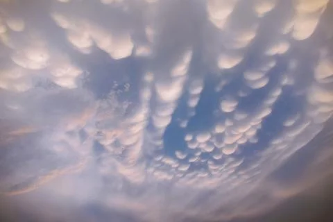 Mammatus Clouds: Breathtaking Cellular Pattern Underneath Cumulonimbus Rain.. Stock Photos