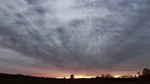 Mammatus clouds in the light of the setting sun Stock Footage 201962588