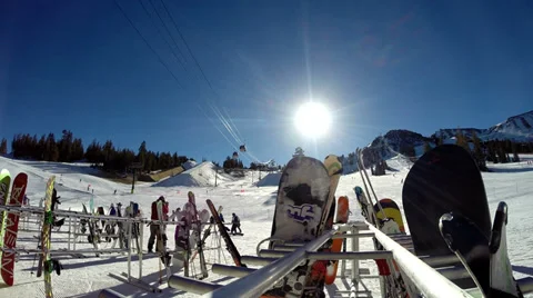 Mammoth, Skiers walking by ski rack Stock Footage 33796008