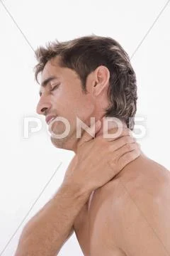 Man, 35+, rubbing his neck, neckpain Stock Photos