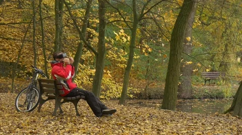 Man in 360Vr Glasses on Bench Leaned Back in Park Watching Video 360 Degrees Stock Footage 69002652