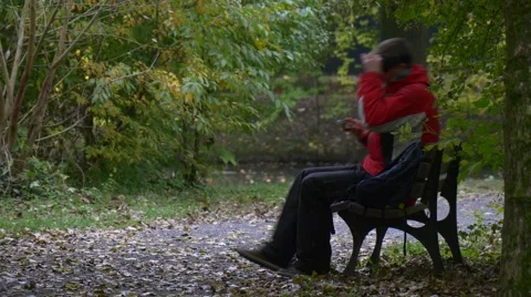 Man in 360Vr Glasses on a Bench Watching Video 360 Degrees Playing Virtual Stock Footage 68686224