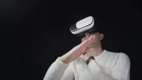 Man in 3D glasses on black background Stock-Footage 124921399