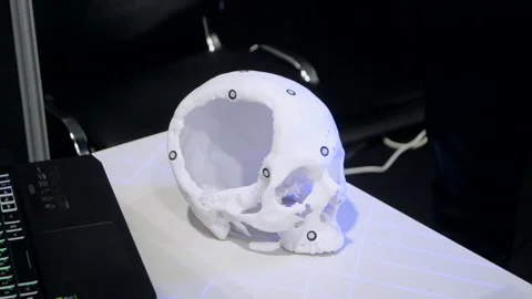 Man with 3d scanner 3d scanning prototype human skull printed on 3d printer Stock Footage 328909549
