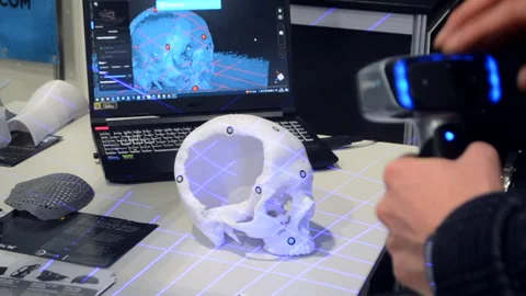 Man 3d scanner 3d scanning plastic prototype human skull printed on 3d printer Stock Footage 328909686