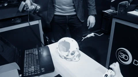 Man 3d scanner 3d scanning plastic prototype human skull printed on 3d printer Video stock 331182467