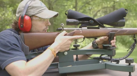 Man  about to shoot a Shotgun on a Range Stock-Footage 53643672